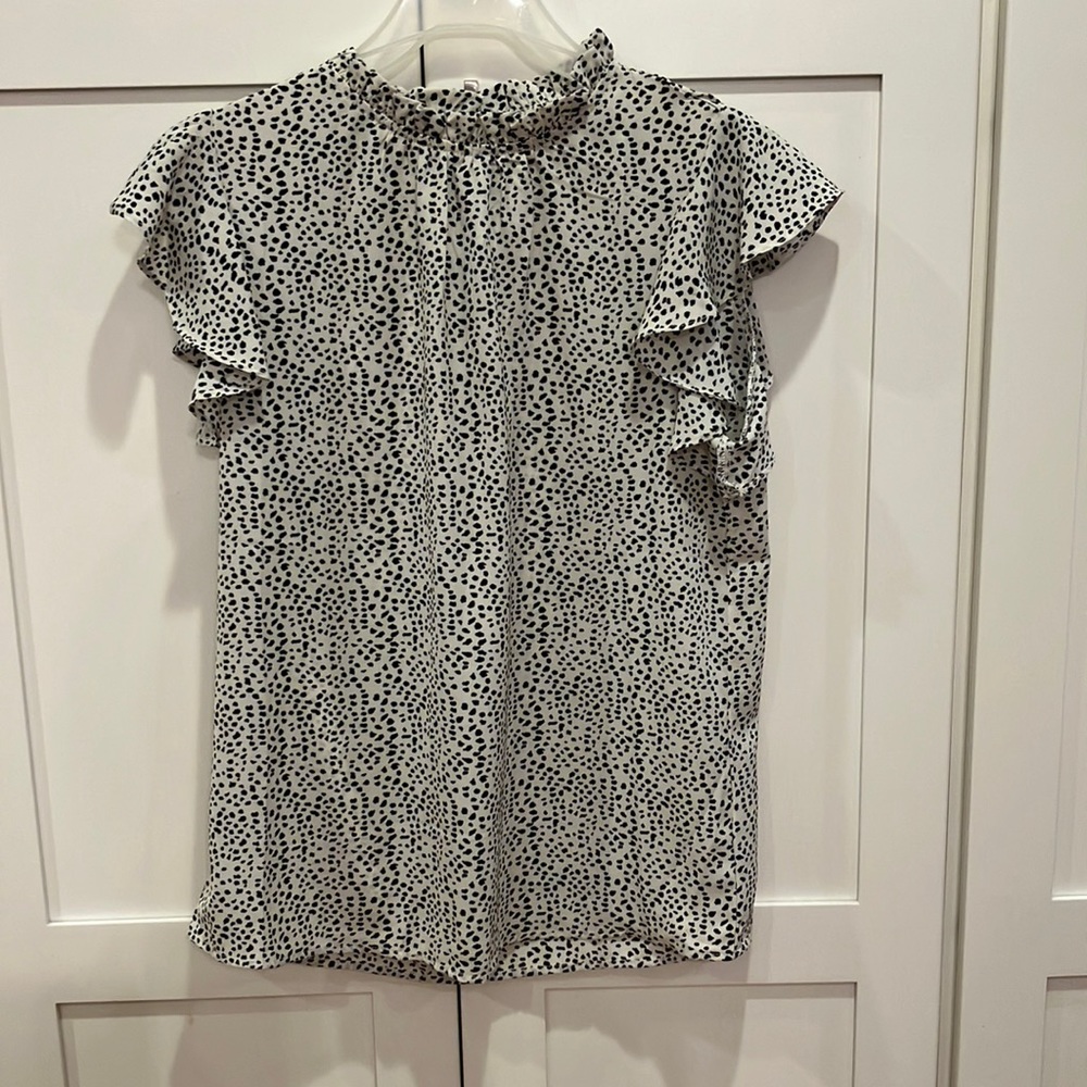 Polka dot ruffle top from Solutions size S